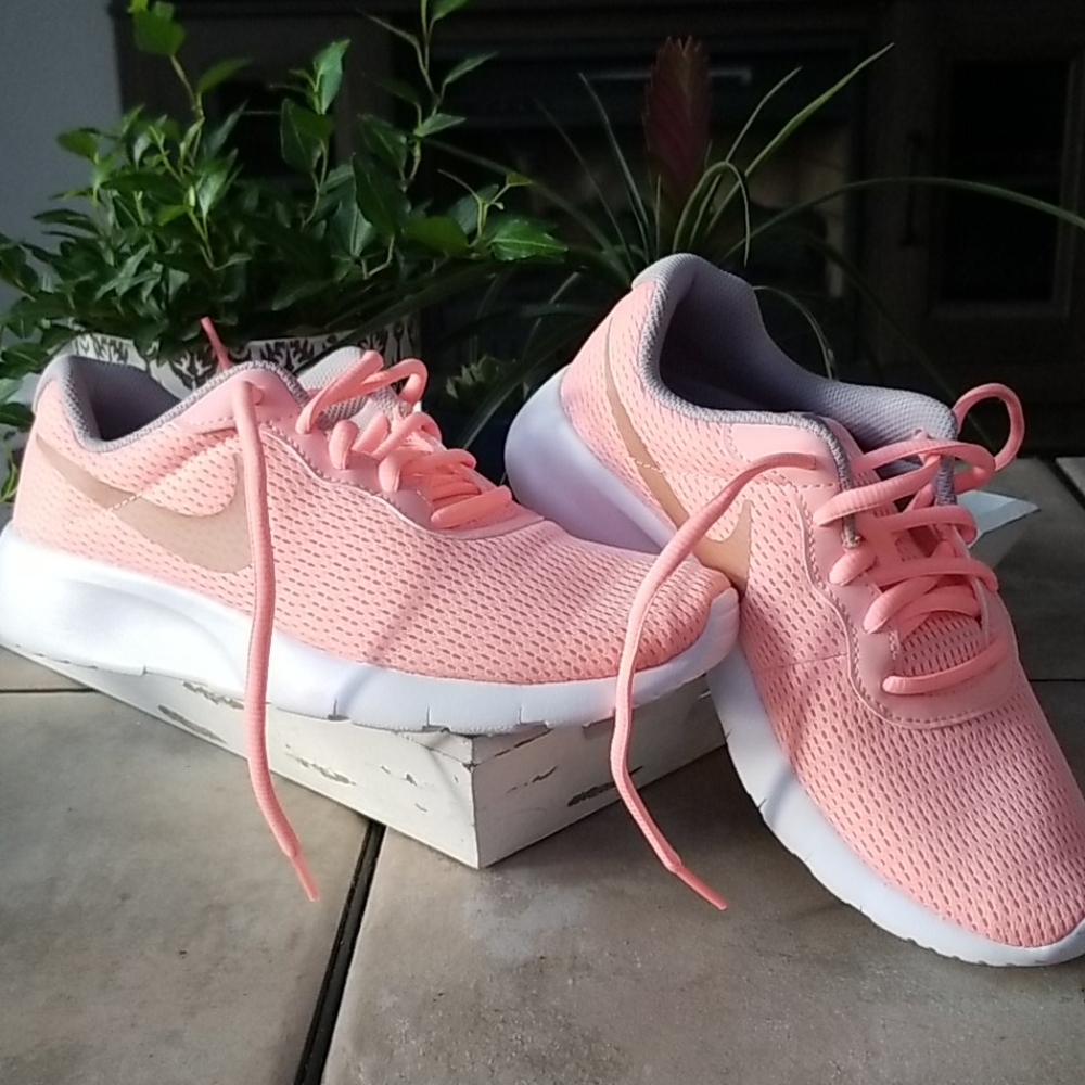 Brand new girls Pink and Rose Gold Nike Shoes